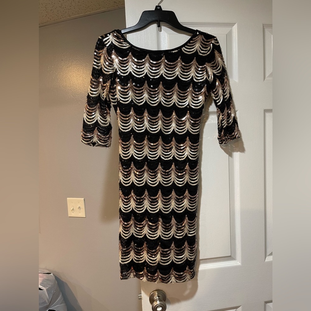 Black and gold sequin dress